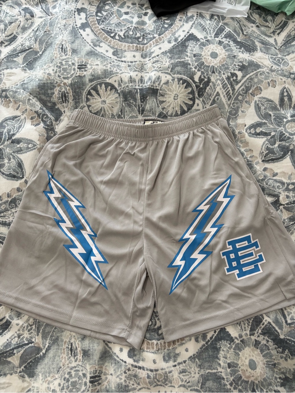 Eric Emanuel Gray Athletic Shorts with Blue Lightning Motifs